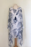 PALM PRINT LONG LINE ASYMETRIC SILK TOP WITH JERSEY CUFF