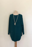JUMPER WITH PEARL BUTTON BACK DETAIL, CURVED HEMLINE AND ROUNDED NECKLINE WITH 2 FRONT POCKETS