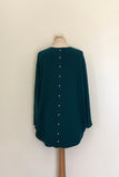 JUMPER WITH PEARL BUTTON BACK DETAIL, CURVED HEMLINE AND ROUNDED NECKLINE WITH 2 FRONT POCKETS