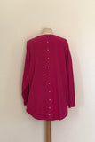 JUMPER WITH PEARL BUTTON BACK DETAIL, CURVED HEMLINE AND ROUNDED NECKLINE WITH 2 FRONT POCKETS