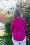 JUMPER WITH PEARL BUTTON BACK DETAIL, CURVED HEMLINE AND ROUNDED NECKLINE WITH 2 FRONT POCKETS