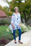 PALM PRINT LONG LINE ASYMETRIC SILK TOP WITH JERSEY CUFF