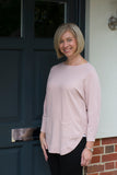 JUMPER WITH PEARL BUTTON BACK DETAIL, CURVED HEMLINE AND ROUNDED NECKLINE WITH 2 FRONT POCKETS