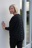 JUMPER WITH PEARL BUTTON BACK DETAIL, CURVED HEMLINE AND ROUNDED NECKLINE WITH 2 FRONT POCKETS