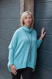 RIB SLEEVE COWL NECK OVERSIZED SWING JUMPER