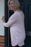 ROUND NECK JUMPER WITH FRONT POCKETS AND SIDE BUTTON DETAIL