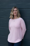 SPRING COLOURED ROUND NECK RAGLAN SLEEVED JUMPER WITH CURVED HEM