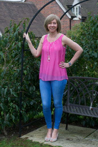 SLEEVELESS SILK TOP GATHERED AT NECK WITH SMALL HEART DETAIL