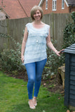 SLEEVELESS SILK RUFFLE TOP