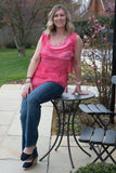 SLEEVELESS SILK RUFFLE TOP