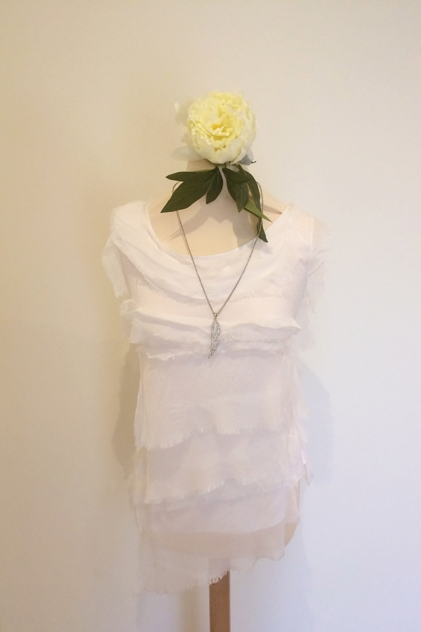 SLEEVELESS SILK RUFFLE TOP